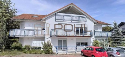 Gepflegtes 6-Familienhaus mit 9 Stellplätzen – voll vermietet, solide Kapitalanlage!