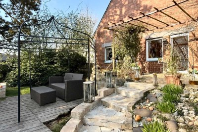 Großzügiges Familienhaus mit grüner Energie und Gartenparadies auf Eigentumsgrundstück