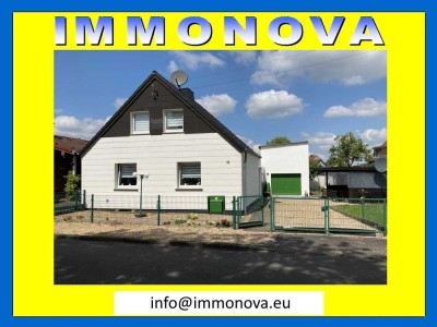 Gepflegtes, freistehendes Einfamilienhaus mit Garten und Garage und ruhiger Lage