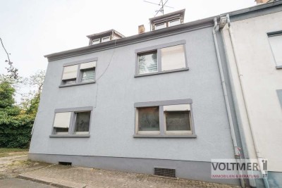 TRIO - Dreifamilienhaus mit neun Garagen und Stellplätzen in ruhiger Lage von Neunkirchen!