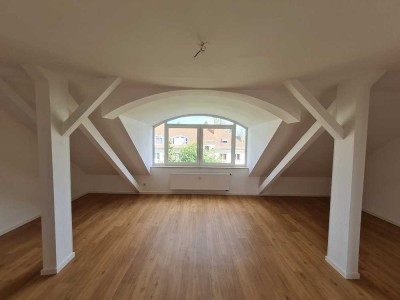2-Zimmer Dachgeschosswohnung mit Nähe zum großen Garten