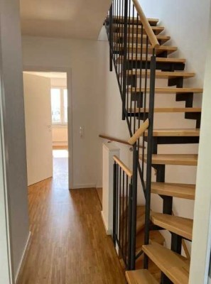 Moderne, großzügige Maisonette-Wohnung mit Einbauküche