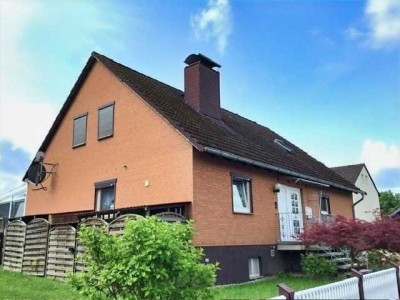 Großzügiges Ein- bis Zweifamilienhaus mit Wintergarten und Doppelgarage!