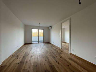 Dachgeschosswohnung mit Blick ins Grüne – stilvoll wohnen am Waldrand