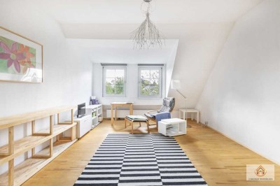 Stilvolle Maisonette-Wohnung mit Garten und Stellplatz in begehrter Lage