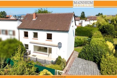 Großzügiges Mehrfamilienhaus mit Gartenidylle und Potenzial in Frankfurt-Goldstein