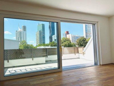 Provisionsfreie, klimatisierte Dachgeschosswohnung nahe der UNO-City – 2 Terrassen, Fitnessraum, PKW-Stellplatz – Erstbezug