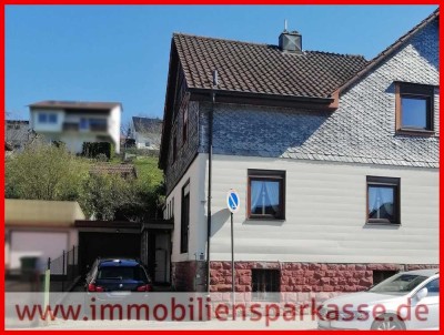 Haus mit Garten, überdachter Terrasse und Garage!