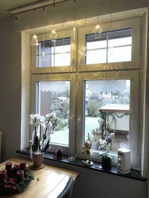 Attraktive 3-Zimmer-Wohnung mit großem Küchen-/Essbereich, Garten und Garage – 85 m² Wohnfläche