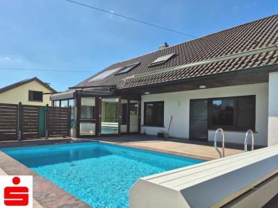 Architektenhaus mit Einliegerwohnung, Wintergarten & Schwimmbad im Öhringer Süden