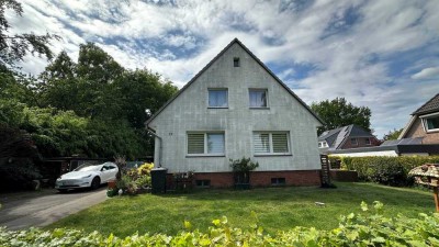 Sanierungsbedürftiges Einfamilienhaus mit Einliegerwohnung und Wintergarten in Norderstedt