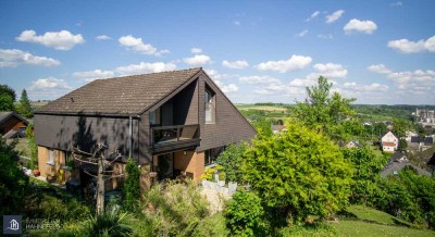 Freistehendes Einfamilienhaus mit Panoramablick und Einliegerwohnung.