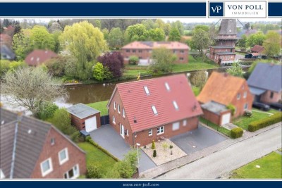 Traumhafte Wasserlage trifft moderne Effizienz – DHH in KfW 50 Bauweise