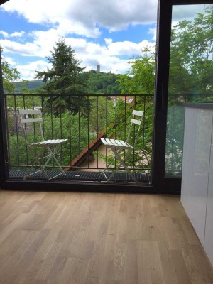Lichtdurchflutete 3-Zimmer-Dachgeschosswohnung mit EBK und freier Aussicht