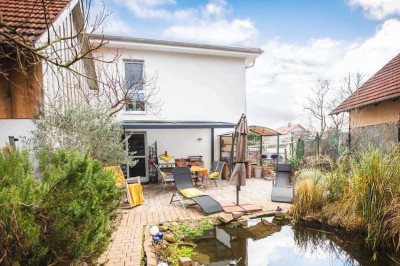 Nachhaltiges Einfamilienhaus mit Gartenidylle & Doppelgarage – Effizienzhaus KfW55 in Muggensturm