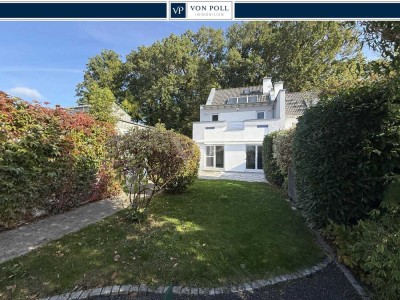 VON POLL - FRIEDRICHSDORF: Moderne, große Doppelhaushälfte in Feldrandlage Dillinger Hang