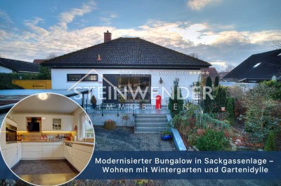 Modernisierter Bungalow in Sackgassenlage – Wohnen mit Wintergarten und Gartenidylle