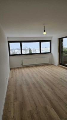 2,5-Zimmer-Wohnung mit großer Terrasse, Einbauküche & Blick ins Grüne – barrierefrei