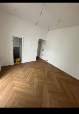 Exklusive 1-Zimmer-Hochparterre-Wohnung mit geh. Innenausstattung mit Balkon