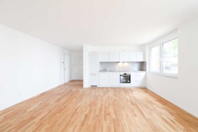 Sonnige EG-Oase mit großzügiger Terrasse und stilvoller Einbauküche! *Inkl. Baustellenrabatt*