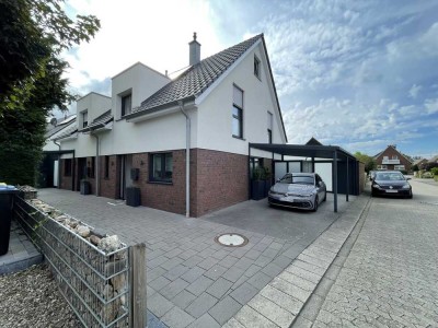 Exklusive Doppelhaushälfte links der Ems – stilvoll wohnen in bester Lage