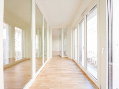 Lichtdurchflutete 2-Zi.-Wohnung mit Wintergarten in bester Wohnlage *ERSTBEZUG*