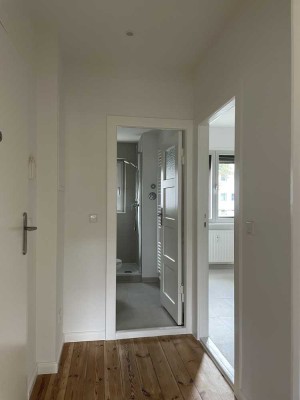 Modernisiertes Dachgeschoss mit Einbauküche
