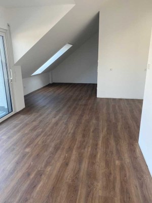 Erstbezug mit Balkon: Exklusive 4-Raum-DG-Wohnung mit gehobener Innenausstattung in Paderborn