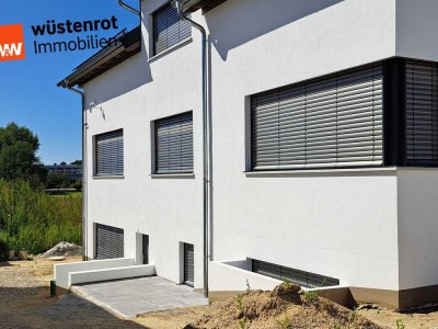 Erstbezug! 2-Zimmer-Einliegerwohnung im UG mit überdachter Terrasse