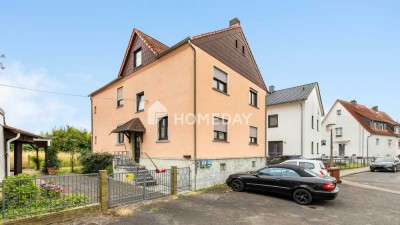 Charmantes Mehrfamilienhaus mit großzügigem Raumangebot und zwei Balkonen