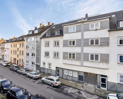 1,5-Zimmer-Rohbauwohnung mit Südbalkon in gepflegtem Altbau