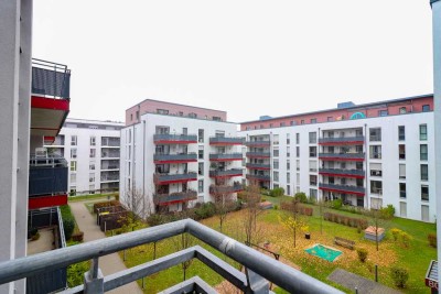Wohnen mit Weitblick: elegante Etagenwohnung mit großzügigem Balkon und moderner Markenküche
