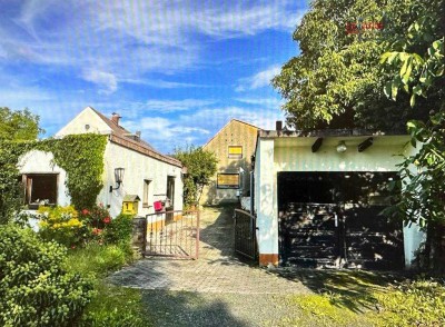 EFH INKL. GRUNDSTÜCK U. NEBENGEBÄUDE ZUM SELBSTAUSBAU - EIN WOHLFÜHLPARADIES IN IDYLLISCHER LAGE