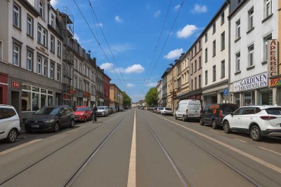 Attraktives Mehrfamilienhaus mit großzügiger Gewerbefläche in zentraler Lage!