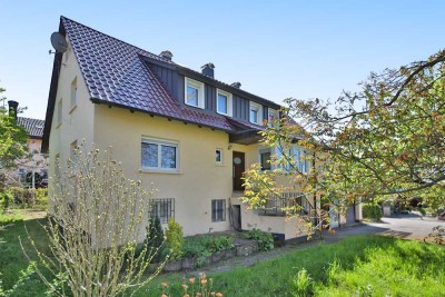 Charmantes Zweifamilienhaus mit Weitblick – renovierungsbedürftig, aber voller Möglichkeiten