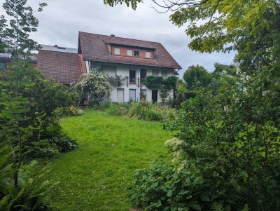 Großes Mehrfamilienhaus mit fantastischem Garten