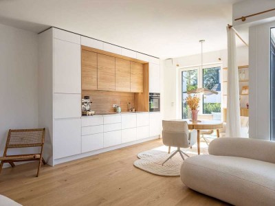 Lichterfüllter Neubau. 2-Zimmer-Erdgeschosswohnung mit Garten.