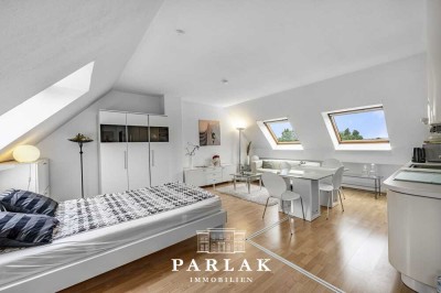 Charmantes Dachgeschossapartment mit Einbauküche, großzügigem Bad und Tiefgaragenstellplatz
