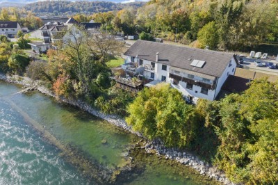 Einfamilienhaus mit Einliegerwohnung und Geschäftsraum