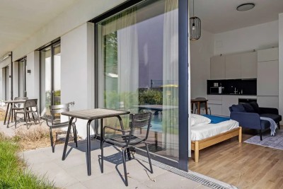 Helle Studio Gartenwohnung voll möbliert und einzugsbereit
