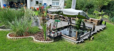 Winderschönes Haus mit großem Garten,  Teich und vielen Blumen in ländlicher ruhiger Gegend